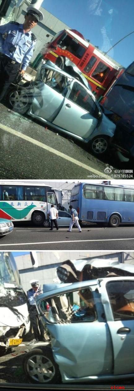上海中环早高峰发生车祸 比亚迪F0被挤成“小方块”
